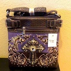 Beautiful Western Bag With Crossbody Strap . In Front You Can See Cross . Around Is Embroidery And Embossed Studs Also Have Lining Inside And One Zipper Inside And One Zipper Outside. Very Sturdy.Can Use For Any Occasion. Brand New. It Also Comes In Pink &Turquoise. Color V Nice Looking. Purple Embroidered Bag For Gift, Purple Satchel Shoulder Bag Gift, Purple Crossbody Bag For Gift, Purple Crossbody Bag As Gift, Purple Shoulder Bag With Removable Pouch For Gift, Embroidered Purple Shoulder Bag For Daily Use, Purple Embroidered Shoulder Bag For Daily Use, Embroidered Purple Shoulder Bag For Everyday Use, Purple Embroidered Bags For Everyday Use