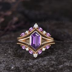 Item description ✦ Handmade, high-quality item! ✦ Material: 925 sterling silver, Solid 10k/14K/18K GOLD (can be made in white/rose/yellow gold) Engagement ring ✦ Center stone: Natural Purple Amethyst. ✦ Size/Weight: 5x9mm Long Hexagon Cut Wedding band ✦ Gemstones: Marquise Cut Natural Amethyst and Round Cut Moissanites Any ring size can be made,if the ring size is not in the option list ,contact me. As it is handmade,it needs 2-4 weeks to finish and then be shipped by usps or DHL. Return policy: Purple Octagon Rings For Anniversary, Octagon Amethyst Ring With Accent Stones For Anniversary, Anniversary Octagon Amethyst Ring With Accent Stones, Heirloom Style Emerald Cut Amethyst Ring As Gift, Heirloom Style Amethyst Ring With Emerald Cut Gift, Heirloom Amethyst Ring With Emerald Cut Perfect Gift, Heirloom Amethyst Ring With Emerald Cut As Gift, Heirloom Emerald-cut Amethyst Ring As Gift, Amethyst Engagement Ring