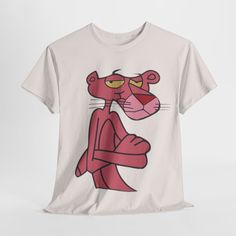 a white t - shirt with an image of a pink cat on it's chest