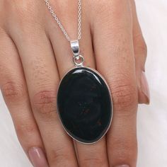 Bloodstone Pendant, 925 Sterling Silver Pendant, Boho Pendant, Oval Shaped Pendant, Statement Necklace, Gemstone Jewelry, Handmade Necklace Gemstone Name- Bloodstone Stone quality - AAA Pendant size - Height - 5 cm, Width - 2.6 cm Pendant weight - 11.13 grams Stone Shape - As shown in the picture You'll get the exact product as shown in the pictures The Height of the pendant including the loop is 5 cm 18 inch Chain - The total length of the chain is 18 inch including a 2-inch adjustable chain. So you can adjust the chain from 16 inches to 18 inches. You adjust the chain by placing the lock on the adjustable chain as per your requirement. The motive of adding a 2 inch adjustable is to give our buyers an option to flaunt with different pendants in different ways. Chain weight - 3 grams. You Sterling Silver Necklace With Large Oval Stone, Oval Sterling Silver Necklace With Large Stone, Natural Stones Necklace With Oval Cabochon, Oval Necklace With Large Stone For Gifts, Oval Stone Necklace For Gifts, Gift Necklace With Large Oval Stone, Boho Pendant, Gemstone Jewelry Handmade, Necklace Gemstone