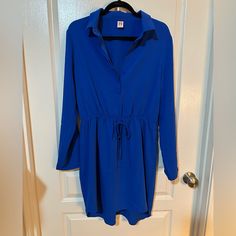 Shirt Dress In Sapphire Blue Gather Tie At Waist Collared And Sleeves Roll Up Dress Never Worn And In Good Condition *Item Sold In Condition Shown In Photos Blue Shirt Dress, Sapphire Blue, Large Size Dresses, Blue Shirt, Roll Up, Blue Sapphire, Sapphire, Shirt Dress, Womens Dresses