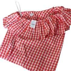 J. Crew One Should Top In Size 10. Coral Colored Gingham Pattern. There Is A Zipper On One Side And A Ruffled Collar. 98% Cotton And 2& Elastane. Summer Gingham Blouse For Picnic, Summer Plaid Blouse For Picnic, Spring Ruffle Blouse For Picnic, Spring Blouse With Ruffles For Picnic, Spring Ruffled Blouse For Picnic, Spring Gingham Blouse With Ruffles, Spring Gingham Blouse For Picnic, Spring Gingham Blouse For Picnics, Short Sleeve Ruffled Tops For Picnic