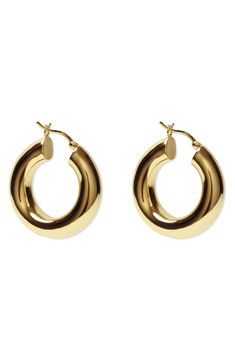 Bold and modern yet ideal for everyday wear, these chunky hoop earrings are made from sterling silver plated in warm 18-karat gold. Snap-post closure Sterling silver/18k-gold plate Imported Luxury Everyday Earrings With Polished Finish, Luxury Polished Everyday Earrings, Modern Chunky Round Earrings, Chic Chunky Hoop Jewelry, Modern Chunky Yellow Gold Jewelry, Modern Gold Plated Polished Hoop Earrings, Modern Gold Plated Round Hoop Earrings, Gold Chunky Round Earrings, Modern Gold Plated Hoop Earrings With Polished Finish