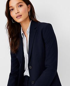 Elevate your wardrobe with the Ann Taylor Petite Long Two-Button Blazer in Seasonless Stretch, a perfect blend of style and comfort. This blazer is tailored to flatter in a sleek Perfect Navy shade, ensuring you look polished at work or any formal setting.

- Size: Petite 00
- Color: Perfect Navy
- Material: Shell: 48% Polyester, 48% Rayon, 4% Spandex; Body Lining: 100% Polyester; Sleeve Lining: 95% Polyester, 5% Spandex
- Gender: Female
- Features: Notched lapel, long button-open sleeves, two-b Navy Pants Suit Women, Author Photos, Beige Suits, Open Sleeves, Work Blazer, Women's Blazers, Pant Suit, Striped Blazer, Casual Blazer