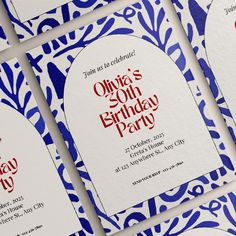 the birthday party is set up with blue and white patterned paper, including red lettering