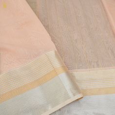 Khinkhwab brings you Maheshwari Sarees. Maheshwari handlooms owe their name to Maharani Ahilyabai Holkar, the ruler of the state of Indore in the late 18th century. Her reign was deemed the Golden Age, and she is revered by all at Maheshwar as Devi Ahilyabai or Ma Saab till date. Maheshwari handlooms derived their fine simplicity from this icon. It is said that under her artistic guidance, the craftspeople made light fabrics, detailed with motifs derived from carvings on the Maheshwar fort- a de Ceremonial Tissue Silk Dupatta With Cutdana, Ceremonial Tissue Silk Saree For Diwali, Traditional Wear With Tissue Silk Border, Ceremonial Tissue Silk Dupatta For Festivals, Ceremonial Cotton Silk Dupatta With Traditional Drape, Ceremonial Cotton Silk Dupatta For Festivals, Ceremonial Pink Chanderi Dupatta, Festival Tissue Silk Traditional Wear With Border, Festival Traditional Tissue Silk Wear With Border