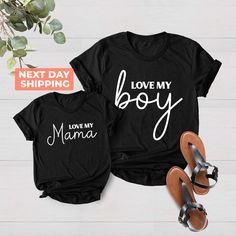 Love my Boy, Just a Mama who Loves her Boy, Matching Tees for Mother's Day, Gift for Mother's Day, Matching T-shirts for Kids and Mama 🎀Welcome to the DerikoClothing! 👕🎁 BLACK TEXT is used for Yellow, Heather Peach, White, Athletic Heather, Mint, Pink, Baby Blue Shirts. Other colored shirts have white text. F I T ∙ & ∙ S I Z I N G : ✨Women's sizes are narrower than the waist. ✨Sleeves are rolled up in some product pictures. They do not come rolled up on delivery. T I M E ∙ T O ∙ D E L I V E R Y : ✨Processing and production time is 1-2 business days. I M P O R T A N T ∙ P L E A S E ∙ R E A D ∙ F U L L Y : ✨ Order cancellations are accepted for 2 hours after purchase. ✨For any questions, please contact me directly. It's my pleasure to assist you. Orders placed till 12 noon are shipped the Matching Black T-shirt With Letter Print, Black Matching T-shirt With Letter Print, Black Family Matching Tops With Text Print, Black Family Matching T-shirt With Name Print, Black Family Matching Tops With Funny Text, Black T-shirt With Name Print For Family Matching, Black Tops With Letter Print For Family Matching, Black Tops With Funny Text For Family Matching, Black Crew Neck Tops For Mother's Day