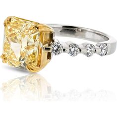 Discover the confluence of artistic legacy and contemporary creativity with the exquisite 3 carat Radiant Cut Diamond Fancy Intense Yellow GIA Engagement Ring. This stunning piece exudes elegance and sophistication, making it the perfect symbol of everlasting love and commitment.Crafted with a 3.62ct Radiant Cut center diamond in a mesmerizing Fancy Intense Yellow hue and IF (Flawless) clarity certified by GIA, this ring is a true testament to exceptional quality and beauty. The center diamond is complemented by delicate Round Brilliant Cut side diamonds totaling 0.40 carats, adding a touch of brilliance and sparkle to the overall design.The allure of this engagement ring is further heightened by its exquisite 18K Two Tone Gold setting, showcasing a blend of white and yellow gold that enha Yellow Platinum Diamond Ring Fine Jewelry, Yellow Platinum Diamond Ring, Luxury Princess Cut Solitaire Jewelry, Fine Jewelry Yellow Diamond Platinum Ring, Platinum Rings With Yellow Diamond Accents, Yellow Platinum Rings With Diamond Accents, Luxury Diamond Solitaire Ring, Luxury Yellow Diamond Ring, Yellow Rings With Diamond Accents In Fine Jewelry Style