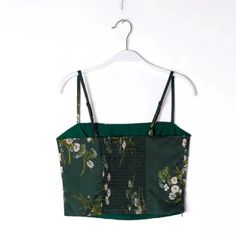 Upgrade your wardrobe with our Green Floral Chinoise Satin Camisole Top! This playful and pretty top features a beautiful Chinoise print on smooth satin fabric. Perfect for a casual day out or a night on the town, this top will add a touch of whimsy to any outfit. Try it out! Gender: WOMEN Item Type: Tops, Camisole, Tank Top Material: Polyester Satin Pattern Type: Print, Floral, Oriental Style: Prairie Chic Decoration: Shirring, Spaghetti Strap Closure Type: Pullover, Elastic Band SIZE CHART Siz Satin Pattern, Prairie Chic, Satin Camisole, Pretty Top, Polyester Satin, Chic Decor, Long Sleeve Maxi Dress, Long Maxi Dress, Satin Fabric