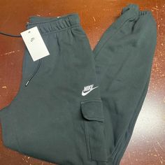 Nike Womens Black Sportswear Essentials Mid Rise Loose Fit Cargo Pants Size S Xl Brand: Nike Department: Women Size: S, Xl Color: Black Type: Pants Style: Cargo Pattern: Solid Theme: Sports Occasion: Activewear Season: All Season Features: Elastic Waist, Pockets Condition: New With Tags I Offer Discounts For All Return Customers. - Jvs Sportswear Tracksuit With Pockets For Loungewear, Sporty Tracksuit With Pockets For Loungewear, Sportswear Tracksuit With Pockets For Gym, Black Sportswear Sweatpants For Workout, Casual Sports Tracksuit With Pockets, Sporty Workout Joggers With Pockets, Black Tracksuit With Pockets For Streetwear, Casual Tracksuit With Side Pockets For Sports, Sportswear Tracksuit With Side Pockets For Sports