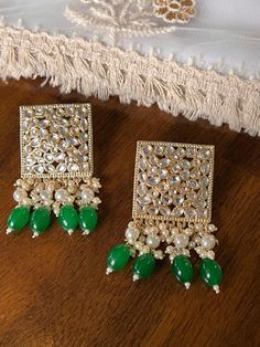 Kundan earrings all Blouses come with margin inside for resizing / customization, please leave a message Green Hoop Earrings For Festivals And Gifts, Green Rectangular Earrings, Handmade Rectangular Wedding Earrings, Kundan Earrings, Womens Clothing Tops, Jewelry Earrings Dangle, Etsy Earrings, Dangle Earrings, Jewelry Earrings