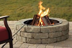 Add charm to a backyard or garden with the flagstone fire pit kit, a do-it-yourself retaining wall product that offers a natural flagstone fire pit. Oldcastle 43.5-in L x 43.5-in W x 12.5-in H Sandhill Concrete Fire Pit Kit in Brown | 70583416 Retaining Wall Block, Fire Pit Materials, Concrete Retaining Walls, Fire Pit Ring, Metal Fire Pit, Fire Pit Kit, Cool Fire Pits, Fire Pit Furniture, Concrete Fire Pits