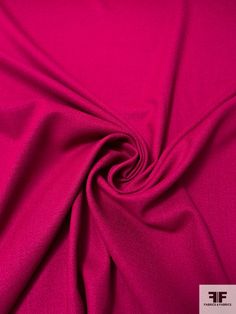 a close up view of a bright pink fabric