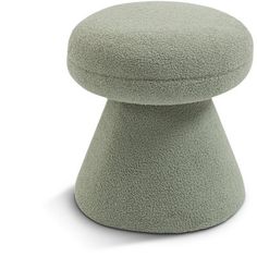 the foot stool is made out of sheepskin and has a rounded top, with a circular