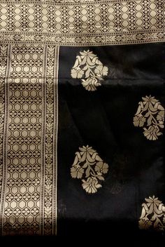 Black Exclusive Beautiful Black Traditional Banarasi Saree, Handloom SarI, Banarasi Silk with Golden Zari Weave Work, Banarasi Silk Saree with rich Pallu, Shipping from USA. Item : Saree Color : Black/Gold Base Fabric : Banarasi Silk Blouse piece : Black and Gold Border Blouse material : Banarasi Silk Saree Length: 5.5 Meter , Blouse Length: 0.8 Meter Occasion: Party, Wedding, Festival, Wedding, Traditional, Religious, House-warming, Social Gatherings and Celebrations. Saree comes with unstitched blouse piece, Stitching service is available. We provide Fall, Pico and blouse stitching with Additional charge Please check carefully when you order. Blouse Stitching :custom size Blouse please provide your measurements fallow the last picture. SHIPPING TIME: This product will be shipped to you w Black Art Silk Dupatta With Pallu, Elegant Black Art Silk Dupatta, Black Banarasi Silk Saree With Pallu, Traditional Black Saree With Pallu, Semi-stitched Black Traditional Wear With Pallu, Festive Black Saree With Zari Weaving, Navratri Black Self-design Blouse Piece, Black Blouse Piece With Pallu For Eid, Festive Black Katan Silk Dupatta