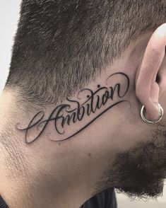 a man with a tattoo on his neck has the word emotion written in cursive font