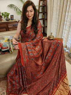 Update! - Zynah covered by LBB - https://lbb.in/bangalore/zynah-designs-handloom-sarees/ Collection: Daastaan-e-Ajrakh Introducing our Madder Red Ajrakh Modal Silk Saree - a timeless blend of tradition and elegance. Immerse yourself in the artistry of block printing with natural dyes, creating a vivid canvas of colors. Adorned with new lotus motif blocks, this saree exudes sophistication. The Lagdi Patta Pallu adds a touch of grace, making it a perfect choice for those who appreciate craftsmanship. Embrace the allure of tradition with our Ajrakh Modal Silk Saree - where history meets contemporary chic. About The Craft: Ajrakh Craft, rooted in Gujarat and Rajasthan, India, is a heritage-rich textile tradition celebrated for its intricate hand block printing and 100% natural dyes. Derived fr Ajrakh Saree Styling, Festive Bohemian Pre-draped Tussar Silk Saree, Bohemian Art Silk Pre-draped Saree With Dupatta, Festive Bohemian Art Silk Pre-draped Saree, Bohemian Red Pre-draped Saree For Festive Occasions, Bohemian Bandhani Print Choli In Chanderi, Festive Kalamkari Print Pre-draped Saree In Slub Silk, Bohemian Choli With Bandhani Print In Chanderi, Bohemian Chanderi Choli With Bandhani Print