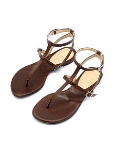 Editor's NotePretty yet comfy sandals will complete your summer look- Gladiator-like strappy sandals- Adjustable fit with the buckles on the straps- The ankle strap secures the feet- Flat design that goes with everything in the summerMeasurement (inch)- KR230(US 6)-KR255(US 8.5)- Height 0.4in.* Fits true to the size* Please refer to the size chartComposition & Care- Goat skin* Deformation or discoloring might happen if in contact with humid air or high temperature* Avoid rain and snow* Summer T-strap Sandals With Adjustable Ankle Strap, Brown T-strap Footbed Sandals For Summer, Beach Toe Ring T-strap Sandals With Buckle Closure, Summer Strappy T-strap Sandals With Buckle Closure, T-strap Toe Ring Sandals With Buckle Closure, Summer T-strap Slingback Sandals With Buckle, Adjustable T-strap Toe Ring Sandals With Buckle, Summer T-strap Slingback Sandals With Buckle Closure, Adjustable T-strap Toe Ring Sandals With Buckle Closure