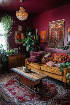 a living room filled with furniture and lots of plants