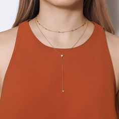 Lariat Necklace, Dainty Necklace, Layer Necklace, Y Necklace, MEASUREMENTS & MATERIALS - .925 Sterling Silver / 14K Gold Vermeil / 14K Rose Gold Vermeil - Cubic Zirconia Crystals - Pendant Height 2 1/2 in | 6.3 cm - Chain 18 in | 45.7 cm - Hypoallergenic, lead & nickel free - Handcrafted in NYC COMPLETE THE LOOK: - Crystal Choker N062: https://www.etsy.com/listing/484350920/ - Love Knot Necklace N316: https://www.etsy.com/listing/600399896/ To shop more Y Lariat Necklaces: https://www.et Minimalist Station Necklace With Satellite Chain, Minimalist Layered Choker Necklace, Minimalist Station Necklace With Delicate Chain For Layering, Minimalist Delicate Chain Charm Necklaces For Layering, Minimalist Delicate Chain Necklaces For Layering, Minimalist Double Strand Layered Necklace, Minimalist Layered Necklace With Satellite Chain, Minimalist Charm Necklaces For Layering, Minimalist Layered Long Necklace With Clavicle Chain