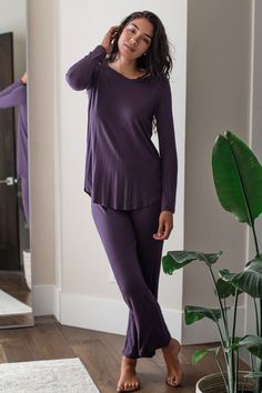 The Norah Pajama Set provides full coverage comfort and warmth to keep you cozy through the night. Full-length, relaxed fit pant with elastic waist. Long-sleeve top with a gentle V-neck and curved hemline. 30" inseam. Favorite Pairings: Serenity Robe, Kendra Robe, Brooke Cardigan Night Wear For Women, Men's Bedding, Silk Clothing, Bamboo Pajamas, Silk Outfit, Wrap Jacket, Eco Friendly Clothing, Sleeveless Tunic, Womens Size Chart