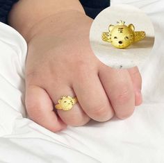 Gold Tiara Tiger Baby Ring 24K 0.999 Pure 1.875g(반돈) It's a perfect gift for a baby who was born in 2022 the Year of the tiger The tiger is the 3rd of the twelve animal signs that make up the Chinese zodiac. Celebrate your loved one's Baeke-il (100days) or Dol(1st birthday party) with our dainty, delicate and simple, minimalist Pure Gold 24K Tiger Ring. It can be engraved inside of the ring(Any 3 characters maximum) -example 1) ARI 2) 하진 💕Weigh: 1.875g(반돈) Please check the size for each of ring 22k Gold Round Engraved Ring Gift, 22k Gold Engraved Round Ring As Gift, 22k Gold Engraved Round Ring Gift, Yellow 14k Stamped Rings As Gift, Animal Signs, Tiger Baby, Tiger Ring, Baby Ring, Baby Rings