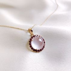 This stunning pendant is set in 14k Solid Yellow Gold with Natural Rose Quartz & Rhodolite Garnet with utmost precision. It is an unique gemstone pendant for nearly every occasion and is completely hassle-free jewelry. 🔷ABOUT GEMSTONE:  Rose quartz is often called the "Stone of Love" and is believed to promote all forms of love, including self-love, romantic love, and love for others.  ♥ Zodiac: Rose Quartz is known as the birthstone for people born under the Taurus zodiac sign. ♥ Birthstone: R Rose Quartz Gold Ring, Elegant Rose Cut Diamonds Gemstones For Gift, Elegant Rose Cut Diamonds For Gifts, Rose Gold Gemstones For Gifts, Fine Jewelry, Rose Gold Fine Jewelry Gemstones As Gifts, Handmade Jewelry Box, Rose Quartz Jewelry, Rose Gold Quartz, Garnet Gem