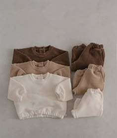 Super cozy ribbed set with elastic banding at hem, waist and ankles for a snug but comfortable fit. Snap button closure sat neck. Solid Color Playtime Sets For Fall, Fall Playtime Solid Color Sets, Cozy Playtime Sets For Fall, Casual Cream Sets For Playwear, Casual Cream Playwear Sets, Ribbed Set, Top And Bottom Set, Baby Fits, Baby E