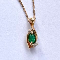 Gorgeous little oval emerald and brilliant cut white diamond pendant. This beautiful little necklace is set with a  fine quality 0.25ct emerald and 3 x little diamonds, total 0.027cts Chain included. This emerald is in excellent condition and is a fine emerald of a fantastic bright green colour which is the top quality. Condition: Excellent  Chain length: 18 inches ( 45.72cm ) Pendant size: 15mm x 6mm This fabulous emerald and diamond pendant has a 14k mark on the catch, but in addition has been Monogram Ring Gold, Vintage Gold Bracelet, Bunny Necklace, Colored Stone Rings, Monogram Ring, Gold Signet Ring, Gold Monogram, Emerald Pendant, Emerald Necklace