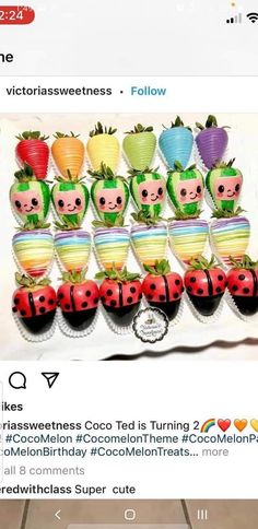 a bunch of fake strawberries with faces on them