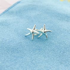 Dainty Starfish Stud Earrings Elegant Hypoallergenic Star Earrings, Silver Ocean-inspired Earrings, Nickel-free Silver Ocean-inspired Earrings, Star-shaped Earrings For Beach With Pierced Ears, Ocean-inspired Sterling Silver Drop Earrings, Ocean-inspired Starfish Charm Earrings, Ocean-inspired Silver Jewelry With Matching Earrings, Star-shaped Earrings For The Beach, Ocean-inspired Single Earring As Gift