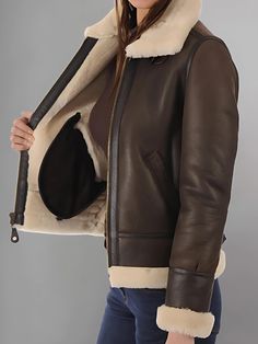 Step into classic aviator style with the Aviator Women's Distressed Brown Jacket. Crafted from high-quality distressed brown leather, this jacket exudes rugged elegance and timeless charm. Inspired by vintage aviator jackets, this piece features all the iconic elements that make the style so enduring. From the oversized lapels and asymmetrical zipper to the cozy shearling lining, every detail is designed to evoke the spirit of adventure and exploration. The distressed finish adds a touch of authenticity and character, giving the jacket a lived-in look that only gets better with age. Whether you're flying high or exploring the urban jungle, this jacket will be your trusty companion on any journey. The versatile brown hue pairs effortlessly with a wide range of outfits, from casual jeans and Rugged Brown Outerwear With Padded Collar, Classic Brown Leather Jacket With Padded Collar, Rugged Brown Leather Jacket With Padded Collar, Classic Aviator Leather Jacket With Padded Collar, Brown Aviator Biker Jacket For Fall, Brown Rugged Sheepskin Leather Jacket, Brown Sheepskin Aviator Outerwear, Rugged Brown Sheepskin Outerwear, Brown Aviator Leather Jacket With Pockets