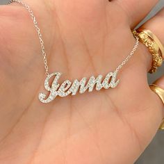 This unique personalized script font nameplate cut-out necklace is composed of 14K solid gold and beautifully pavé set with genuine GVs1 quality natural real Diamonds. This pendant is complemented by a durable 14K solid gold adjustable chain or can be purchased as a charm alone without the chain under the "Length" drop-down menu. NOTE: The item will be made in the exact casing of the characters entered. Please be mindful of this detail when providing the customization desired. Name Dimensions: a Solid Gold Necklace, White Gifts, Script Font, Real Diamonds, Jewelry Gift Box, Name Plate, Name Necklace, Pave Diamonds, Heart Necklace