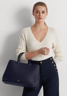 Whether you wear it to work or while running errands, the large Hanna satchel features a sleek, spacious silhouette with a myriad of pockets for storing your necessities. Punctuated with a polished LRL logo, this style is rendered in crosshatch leather for subtle texture and a sophisticated sensibility. Two top handles, each with a 4.5" drop Removable, adjustable crossbody strap with a 16.75" maximum drop length Polished "LRL" metal logo at the front Exterior slip pocket Zip pocket and a slip po Casual Top Handle Satchel For Office, Casual Office Satchel With Top Carry Handle, Chic Workwear Satchel With Handles, Fall Double Handle Satchel For Workwear, Casual Office Satchel With Leather Handles, Casual Fall Satchel For Office, Elegant Blue Bags For Work, Casual Office Satchel For Fall, Casual Fall Office Satchel