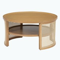 an oval coffee table with perfored design