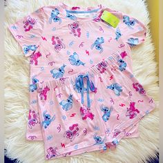 Nwt Stitch And Angel Pajama Short Set Pink Cartoon Print Sleepwear For Loungewear, Pink Cartoon Print Sleepwear, Pink Cartoon Print Sleepwear For Pajama Party, Playful Pink Pajama Shorts For Bedtime, Pink Disney Sleepwear For Bedtime, Disney Style Pink Sleepwear For Bedtime, Pink Cartoon Print Sleepwear For Sleepover, Cute Pink Sleepwear With Cartoon Print, Pink Disney Cotton Sleepwear