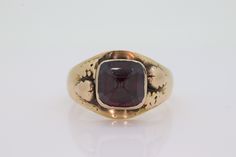 Excited to present this magnificent ANTIQUE Black Hill Gold Ring. Single Pyramid Garnet bezel set with leaf motif. Details 10k Gold. Total weight 5.6grams 8mm Pyramid cut garnet Hallmarked Blk.Hills Ring Shows significant wear but is consistent with age. Give the ring beautiful character Antique Bezel Set Signet Ring For Formal Occasions, Antique Signet Ring With Bezel Setting For Formal Occasions, Antique Bezel Setting Formal Jewelry, Antique Formal Jewelry With Bezel Setting, Black Hills Gold Rings, Beautiful Character, Black Hills Gold, Leaf Motif, Black Hills