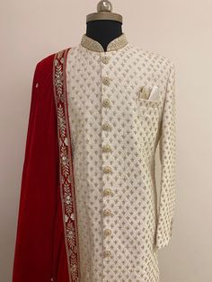 This Wedding sherwani come in a wide variety of colors, embellishment, and outlook. Usually these designer wedding sherwanis are very lavish with the combination of vibrant hues, heavy embroidery with credible detailing like zari, zardozi, sequins, thread work & dori work and the outfit is complimented with bottom.The fabrics used is silk material. Make your occasion significant by our striking ensemble which brings out the astonishing charm in you. Includes- sherwani with bottom Colour options Ceremonial Sherwani With Intricate Embroidery In Raw Silk, White Straight Kurta Bandhgala For Wedding, Ceremonial Embroidered Sherwani With Traditional Drape, Festive Sherwani With Intricate Embroidery For Diwali, Ceremonial Bandhgala With Intricate Embroidery, Raw Silk Bandhgala With Dupatta For Traditional Ceremonies, Diwali Festive Sherwani With Intricate Embroidery, Festive Diwali Sherwani With Intricate Embroidery, Wedding Kurta With Intricate Embroidery And Traditional Drape