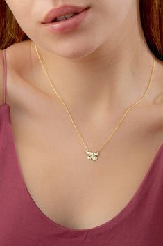 10k 14k 18k Solid Gold Diamond Butterfly Necklace Pendant, Minimalist Gold Butterfly Jewelry, Tiny Gold Diamond Necklace, Anniversary Gift FEATURES * Solid Gold (real gold, not gold plated or gold filled material) * Gold Karat: 10K (417) - 14K (585) - 18K (750) (optional) * Pendant Height: 0.57 Inches (1.45 cm) * Pendant Width: 0.53 Inches (1.34 cm) * Available Gold Color: Yellow gold, rose gold and white gold (optional) * Diamond weight: 0.05 ct * Diamond color: G-H Color * Diamond clarity: SI Minimalist Yellow Gold Necklace With Butterfly Charm, 14k Yellow Gold Necklace With Butterfly Charm, 14k White Gold Butterfly Charm Necklace, 14k White Gold Necklace With Butterfly Charm, Delicate Yellow Gold Necklace With Butterfly Charm, Delicate 14k White Gold Charm Necklaces, Yellow Gold Sterling Silver Necklace With Butterfly Charm, Yellow Gold Sterling Silver Necklaces With Butterfly Charm, Dainty White Gold-plated Charm Necklaces