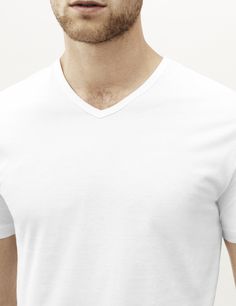 The v neck t shirt is the ultimate understated essential, simple and classic. We stay true to our ethos of comfort and quality with this luxury version. This v neck has been expertly crafted with the finest materials and meticulous attention to detail for an unmatched distinctive style that will look even better with age.

Crafted from our premium lightweight jersey fabric — superfine two-fold (80/2) yarn made from the finest extra long staple Peruvian Pima cotton.

We recommend that you take yo Classic V-neck Relaxed Fit T-shirt, White V-neck T-shirt For Everyday, Modern Solid Color V-neck Tops, Classic V-neck T-shirt With Relaxed Fit, Classic V-neck T-shirt In Relaxed Fit, Modern White V-neck Top, Elegant White T-shirt For Everyday, Stay True, The Men