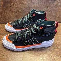 New Adidas Originals Nizza Hi Dl Sneakers Gz2653 Men's Size 6 Or Women's 7.5 Men’s Size: 6 Or Women's Size: 7.5 Color: Black, Green, Orange, White Style No: Gz2653 Brand New With Tags And Never Worn. No Original Box. Please See Photos And Check For Details. Photos Are Of The Actual Shoes That You Will Receive. Also, Please Be Aware That Sometimes Items Can Show Darker Or Lighter In Digital Photographs, But We Always Try To Represent The Items As Accurately As Possible. All Items Come From A Smok Adidas Lace-up High-top Sneakers For Streetwear, Casual Adidas Logo Custom Lace-up Sneakers, Adidas Urban Skate Shoes With Rubber Sole, Urban Green Adidas Sneakers, Adidas Mid-top Sneakers With Vulcanized Sole, Adidas Urban Low-top Sneakers, Outdoor Lace-up Skate Shoes With Vulcanized Sole, Urban Style Slip-on Custom Sneakers, Custom Low-top Sneakers With Vulcanized Sole For Outdoor