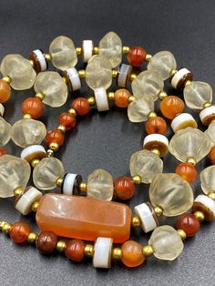 A Unique and rare ancient Himalayan Ancient antique crystals and carnelian beads necklace mala very unique and rare The age of this beads are more than 1000 years old The origin of this beads from Himalaya regions they were used as amulets and in prayer mala we provide fast and free shipping service world wide Unique Amber Carnelian Beaded Necklaces, Spiritual Amber Crystal Necklaces With Round Beads, Healing Amber Agate Crystal Necklace, Spiritual Amber Beads For Jewelry Making, Spiritual Orange Gemstone Beaded Crystal Necklace, Spiritual Orange Crystal Necklaces With Natural Stones, Carnelian Spiritual Beaded Necklace With Natural Stones, Carnelian Amulet Beaded Necklace For Healing, Amber Carnelian Gemstone Beads