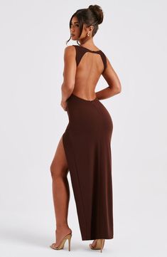 Kassandra is our timeless, chic maxi, cut with a boat neck that fastens to the back neck with a button. This maxi is made from our luxury stretch crepe with a thigh high shaped split and low scoop back. 



Colour: Chocolate.

Luxury stretch crepe.

Fully lined.

High boat neckline.

Button closure on back neck.

Low scoop back.

Thigh high shaped split.

Invisible zipper to the reverse.

Maxi length.

Model is an XS and is wearing an XS.

 Size: XS, S, M, L, XL, XXL Homecoming Dresses Corset, Midi Dress Wedding Guest, Long Sleeve Homecoming Dresses, Split Long Dress, Timeless Chic, Homecoming Dresses Long, Maxi Dress Sale, Sparkle Dress, Maxi Dress Navy