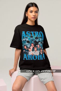 "Astro Aroha Bootleg Shirt - Kpop Retro Tee - Kpop Merch - Kpop Gift - Astro Merch - Astro Bootleg Shirt - Astro Kpop Tee This is our unisex shirt, and it's true to size. To get the oversized look, you have to choose +1 or +2 of your original size number. If you're not sure about your size, you can refer to our size chart. Reach out if you have any issues with your order! The unisex heavy cotton tee is the basic staple of any wardrobe. It is the foundation upon which casual fashion grows. The specially spun fibers provide a smooth surface for premium printing vividity and sharpness. No side seams mean there are no itchy interruptions under the arms. The shoulders have tape for improved durability. .: 100% cotton (fiber content may vary for different colors) .: Medium fabric (5.3 oz/yd² (18 Black Kpop Tops With Letter Print, Black Kpop Letter Print Top, Black Kpop Tops For Summer, Black Kpop Style Summer Top, Black Kpop Summer Tops, Black Kpop Tops With Graphic Print, Harajuku Style Cotton Printed Top, Cotton Harajuku Printed Tops, Cotton Printed Harajuku Tops