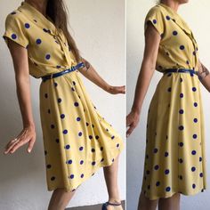 "Beautiful vintage summer dress Gérard Pasquier, Paris. Made in France 1980s Polka dot dress in yellow and blue color. Classic shape . Fitted waist . Ascot collar with scarf finishing on the back. Pleats from waist down . Mid length. Short sleeves. Entierly lined dress. Blue vinyl belt . In perfect condition. Material: Chiffon Size: 42 The model wears usually size S ( EU 36/38) and measures 170cm /66,9\" Measurements (flat): Total length: 105cm - 41,3\" Shoulders (from sleeve to sleeve): 57cm - Yellow Vintage Summer Dress For Daywear, Retro Yellow Dresses With Buttons, Yellow Vintage Dress For Summer Daywear, Retro Yellow Dress With Buttons, Knee-length Yellow Vintage Summer Dress, Knee-length Yellow Vintage Dress For Summer, Yellow Knee-length Vintage Summer Dress, Yellow Knee-length Vintage Dress For Summer, Polka Dot Summer Dresses