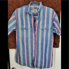 Vintage Striped Button Down Denim Multi Colored Stripes 100% Cotton Tag Size M Measurements: Bust 22 Inches Length 27 Inches (Front) 28 Inches (Back) Sleeves 9.5 Inches $29 1990s Mens Fashion, Clothing Styles, Color Stripes, Mens Clothing, Fancy Dresses, Mens Clothing Styles, Multi Colored, Button Downs, Men's Fashion