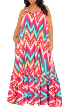 Breeze through your day in this printed maxi dress boasting a flowy silhouette, adjustable straps and handy pockets. Slips on over head Scoop neck Adjustable straps Side-seam pockets 100% polyester Hand wash, line dry Imported Vacation Maxi Dress With Pockets, Beach Maxi Dress With Pockets, Bohemian Maxi Dress With Pockets For Vacation, Multicolor Maxi Dress With Adjustable Straps For Beach, Vacation Maxi Sundress With Pockets, Maxi Sundress With Pockets For Vacation, Color Chevron, Long Shirt Dress, Chevron Print