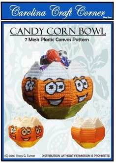 the candy corn bowl is made with crochet and has two faces on it