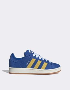 Chaussures, bottes et baskets par adidas Originals La basket est idéale pour les journées de repos Modèle bas Fermeture à lacets Languette et cheville rembourrées Griffe adidas emblématique Semelle extérieure en caoutchouc résistant Semelle texturée antidérapante Modèle unisexe Campus Adidas, Skater Vibes, Basket Style, Baskets Adidas, Adidas Trainers, Popular Sneakers, Adidas Campus, Adidas Gazelle, Swimwear Sale