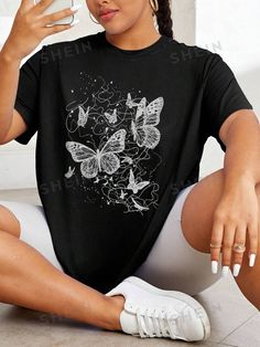 SHEIN LUNE Butterfly Printed Plus Size Women's T-shirt | SHEIN USA Trendy Butterfly Print Crew Neck Tops, Casual Black Tops With Butterfly Print, Casual Black Top With Butterfly Print, Trendy Crew Neck Tops With Butterfly Print, Casual T-shirt With Butterfly Print, Spring Black Graphic Tee Shirt, Butterfly Print Crew Neck Top With Relaxed Fit, Black Graphic Tee For Spring, Butterfly Print Relaxed Fit Crew Neck Top